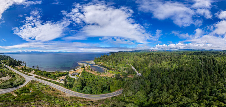 Aerial Panoramic View of Vancouver Island Coastline, Forest and Winding Highway
