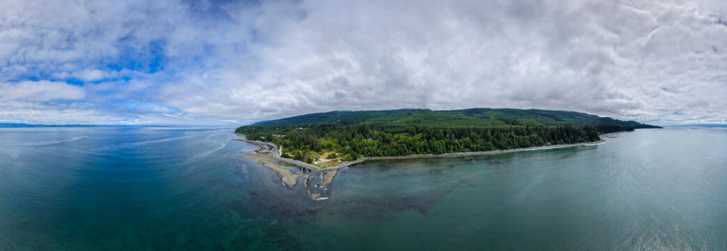 Aerial Panoramic View of Vancouver Island Coastline and Forested Shore in British Columbia, Canada