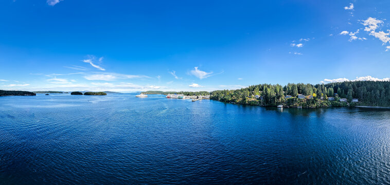 Panoramic View of Swartz Bay Ferry Terminal and Forested Shoreline on Vancouver Island, British Columbia