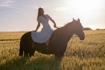 Beautiful woman wtih horse in coutriside © muro
