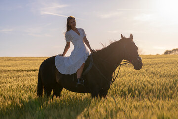 Beautiful woman wtih horse in coutriside © muro
