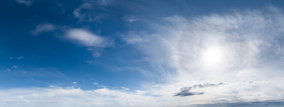Panoramic Blue Sky With Sun and Wispy Clouds Over British Columbia, Canada Coastal Horizon