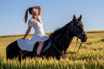 Beautiful woman wtih horse in coutriside © muro