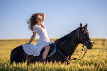 Beautiful woman wtih horse in coutriside © muro
