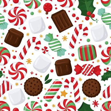 Christmas candy pattern with peppermint swirls, chocolate and marshmallows on white background
