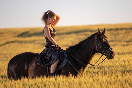 Beautiful woman wtih horse in coutriside
