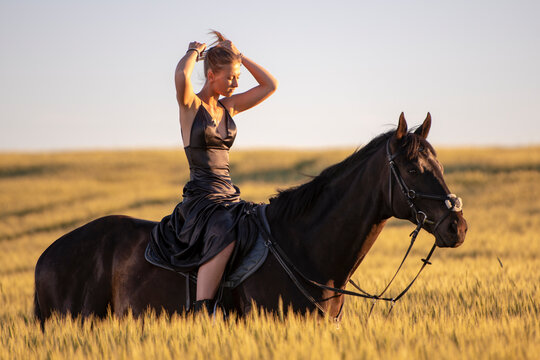 Beautiful woman wtih horse in coutriside