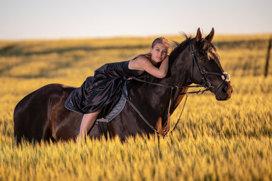 Beautiful woman wtih horse in coutriside