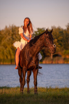 Beautiful woman wtih horse in coutriside