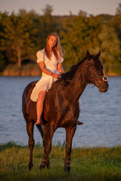 Beautiful woman wtih horse in coutriside