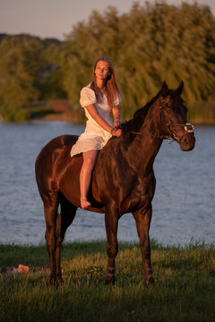 Beautiful woman wtih horse in coutriside