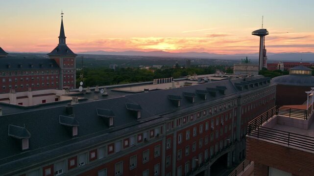 Moncloa lighthouse and rooftops aerial view at sunset, Madrid Spain. High quality 4k footage