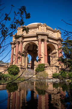 Views of a historic building near water in California during clear weather