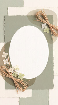 Sage green and cream handmade paper layers with dried hydrangea flowers and raffia bow