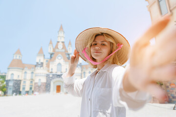 Young caucasian female tourist in amusement park in Nha Trang, travel trip in Vietnam © Parilov