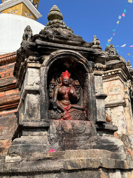 Goddess Hariti located inside a small temple-like structure known as a chaitya or stupa, Kirtipur, Nepal