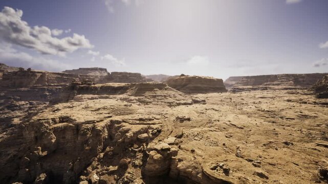 Erosion patterns across plateau reveal climate impact and sedimentary history, cracked surfaces and layered deposits show weathering stages, useful