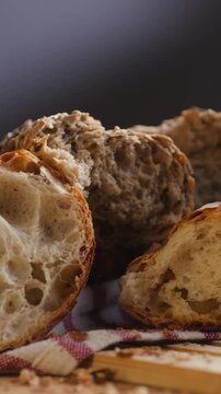 Bread assortment, mixed Spanish baguette loaves from Barcelona bakery, close-up macro shot showing crumb texture