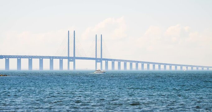 Oresund Bridge spanning blue sea between Sweden and Denmark