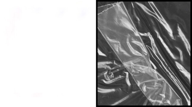 Crumpled plastic wrap texture on black background. Wrinkled transparent cellophane film overlay. Shiny polyethylene material for design.