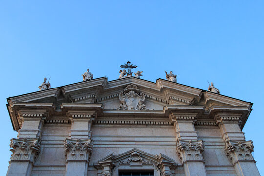 Facade of historical church with statues and cross, Italy, Lombardy, Mantua, 3 June 2026