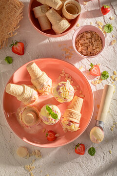 Creamy and fresh strawberry ice cream made of berry fruits.