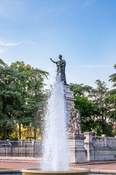 Historic statue behind fountain in park, Italy, Lombardy, Mantua, 3 June 2026