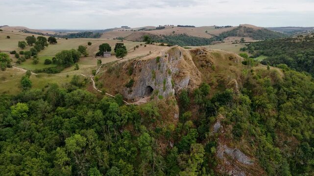 Thor's Cave, Peak District National Park, UK. Drone movement in circle to left. 4k video footage. 