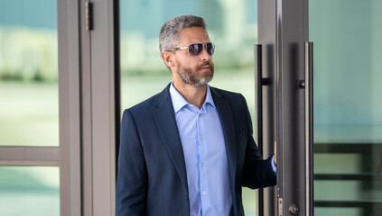 Fototapeta premium Office manager at business break. Successful businessman outdoor. Professional business man wear suit. Business boss portrait of man. Successful business CEO. Professional growth