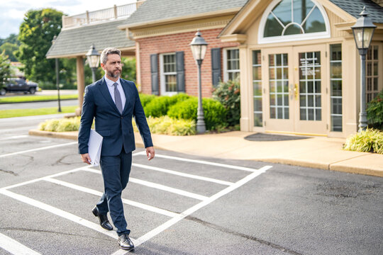 Agent real estate at house for sale. Realtor welcoming visitor. Rent or buy new home. Home insure. Property insurance promotion. Successful broker copy space. Mortgage insurer. American sales manager