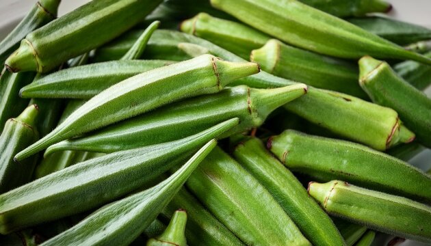 fresh raw okra pods texture full frame close up view organic green vegetables rich in dietary fiber