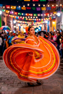 Mexican woman in a vibrant orange folkloric dress dancing and twirling her skirt during the Day of the Dead street festival