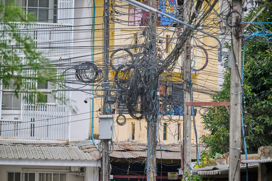 tangle of powerlines in thailand