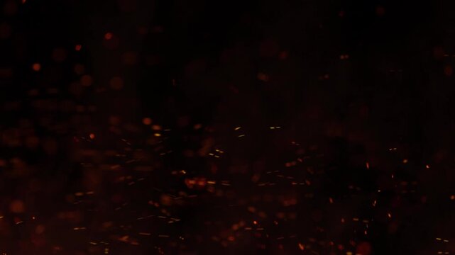 Super Slow Motion Shot of Flying Fire Sparks Isolated on Black Background at 1000fps.