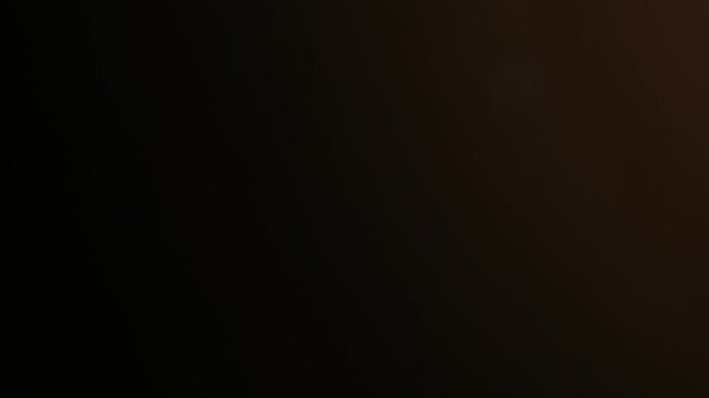 Real Shooted Lens Flare Transitions on Black Background in Slow Motion.