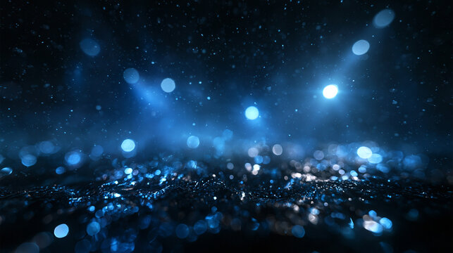 Abstract Blue Bokeh Glitter Particles Background with Glowing Lights