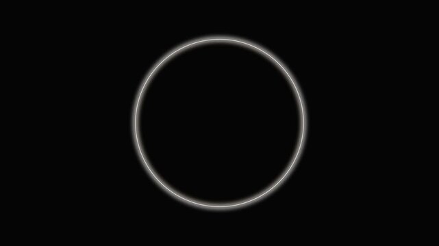 Minimalist glowing white rings pulsing on a black background for futuristic interface design
