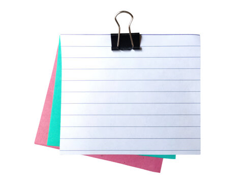 Blank lined paper with binder clip and sticky notes