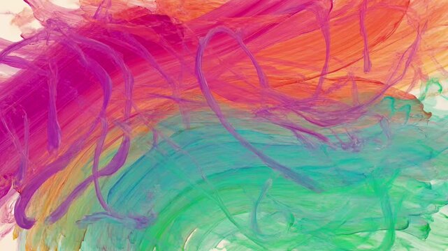 Vibrant watercolor paint strokes creating abstract artistic motion on canvas for creative background video project with colorful liquid pigment swirls