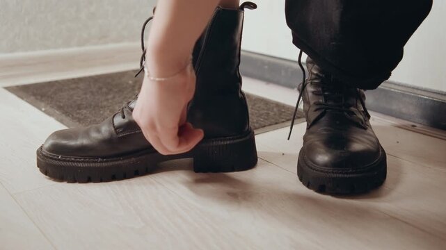City footwear action. Vibrant urban environment showcasing active footwear with city details and movement. Bustling street setting highlighting dynamic combat boots amidst city life and motion