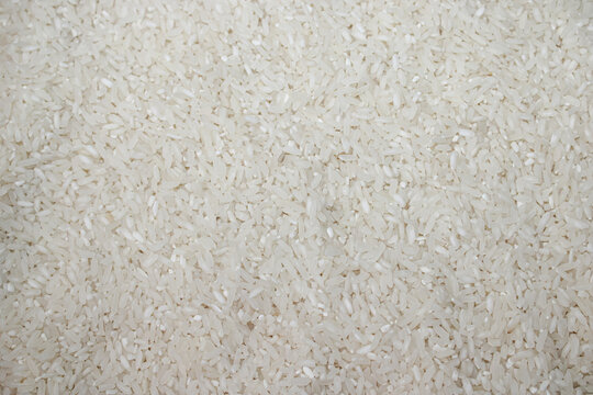 Full Frame Texture Of Raw White Rice Grains Background