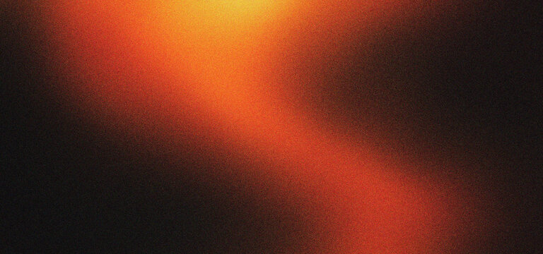 Vintage light leak background with warm orange glow and film grain texture. Retro analog film burn overlay for creative photography. Abstract burnt orange light flare on dark black backdrop.