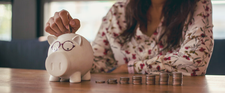 Banner women coin stack piggy bank saving account women planning coin stack wealth growth financial freedom investment budget retirement fund. Banner Hands hold coin stack budget planning copy space