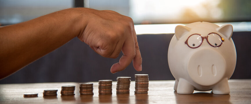 Banner women coin stack piggy bank saving account women planning coin stack wealth growth financial freedom investment budget retirement fund. Banner Hands hold coin stack budget planning copy space