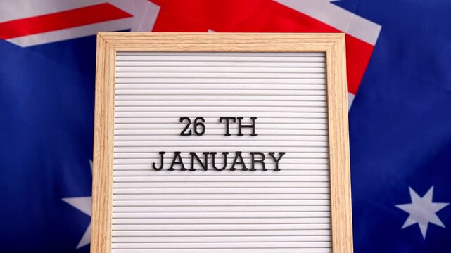 Letterboard with text 26th JANUARY national day promotions. Trendy patriotic mockup with date emphasis Australian flag on background. 