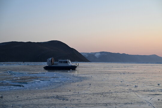 A hovercraft on Lake Baikal in the early winter morning. Olkhon Gate Strait