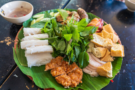 Bun dau mam tom or Vermicelli with shrimp paste. Vietnamese cuisine. Northern Vietnamese dish. It has distinct smells that only locals can enjoy. A combination plate with cooked pork ribs, fried tofu