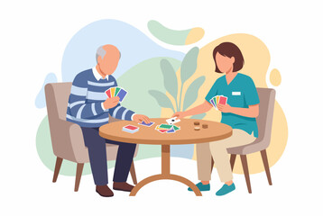 Fototapeta premium Caregiver playing cards with senior man providing social support
