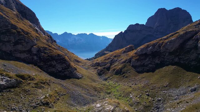 Drone shot of the Albanian albs mountain range with the peaks of the balkans trail.