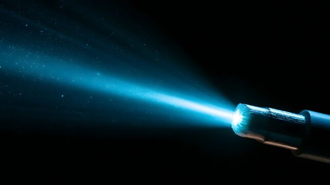 Macro Fiber-Optic Cable End Glowing Cyan